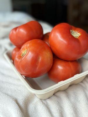 The tomatoes are incredible! $10 for a basket and there are around six big tomatoes in a basket... They are juicy and delicious