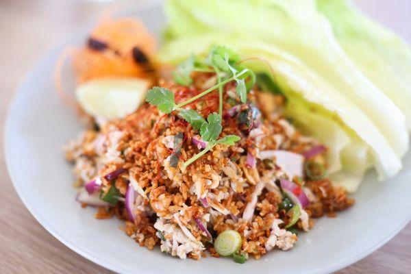 Yum Nam Kao Tod - Crispy rice salad. Choice of Tofu available.