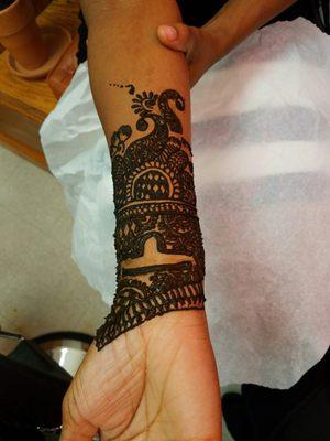 Henna done for the first time for my birthday . And Raj is very patient while incorporating my zodiac.