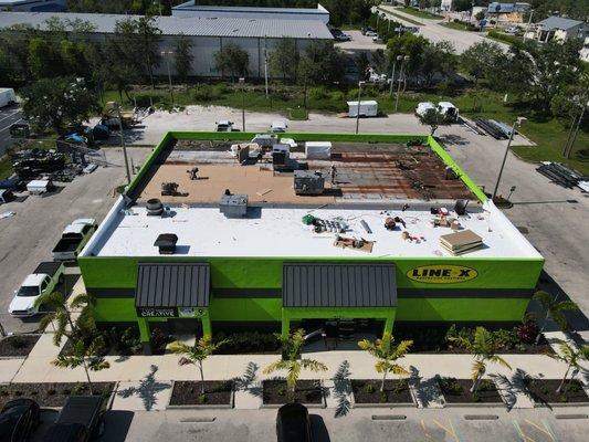 Protect Your Business with Siesta Roofing! Our ongoing TPO full roof replacement commercial project at Line-X.