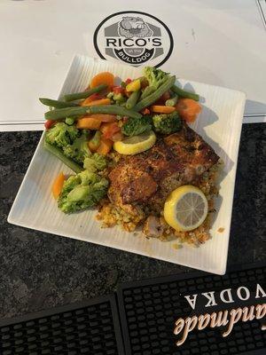 Blknd Salmon over a bed of rice with veggies