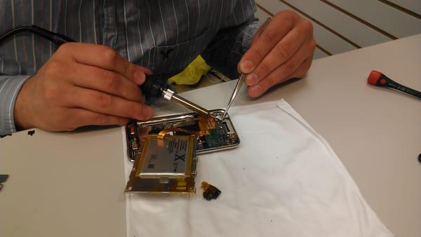 Technician Soldering iPod Touch 4th Gen