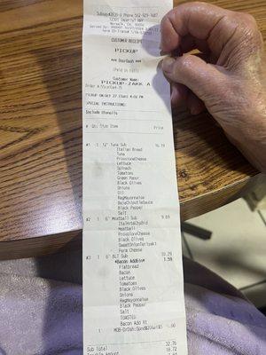 The receipt from online ordering. Charged for bacon on a BLT