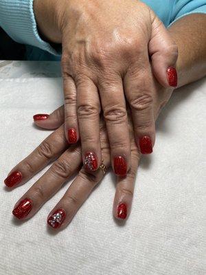 Acrylic nails with gel polish.