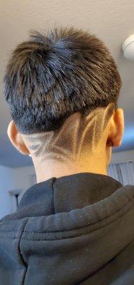 My son's amazing freestyle design by his barber Alec