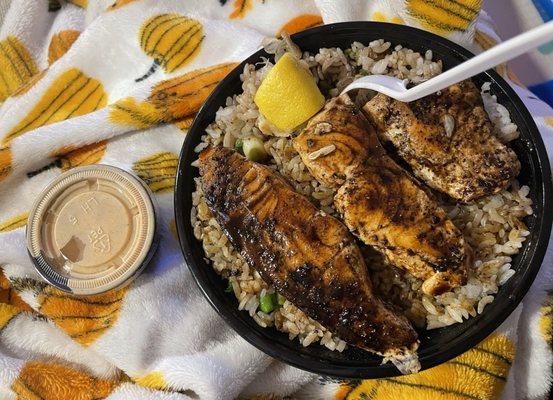 Salmon Bowl well done and pink sauce. The bowl is deep and filled!