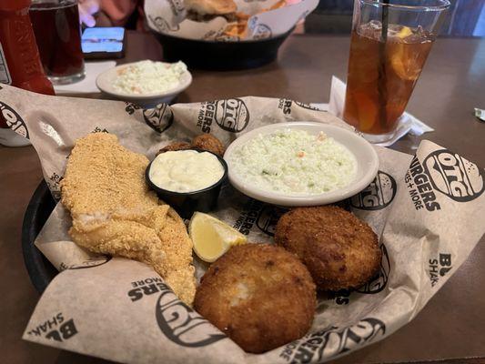 Lunch Catfish Basket with Potato Cakes and coleslaw.