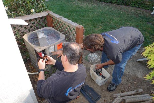 Andrew and Rich examining our old compressor before telling me the bad news... :(