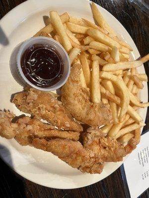 Chicken tenders with fries.