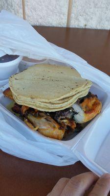 Delicious grilled chicken, carnitas and fluffy corn tortillas