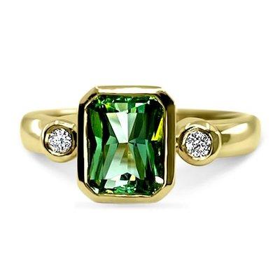 Ladies ring set with radiant cut green Maine tourmaline and diamonds, 14k yellow gold