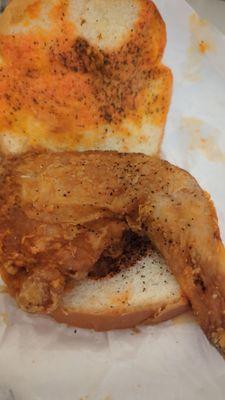 Chicken leg sandwich with salt, pepper and got sauce