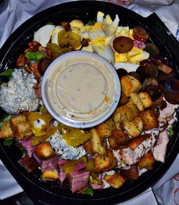 Cobb Salad, with ham, pepperoncini, grapes and cranberries added. Absolutely delicious and so filling!