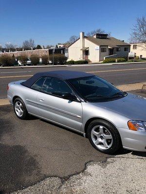 Chrysler Sebring with new canvas top in dk blue