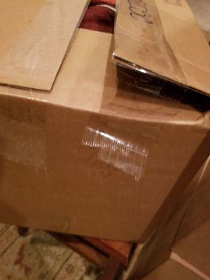 Poorly taped boxes