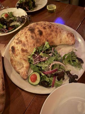 Calzone - massive!  We split between 3 people.  Get extra marinara sauce on side