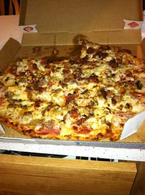 This a thin crust meatsa pizza with bacon mushrooms and onions added! It was great!