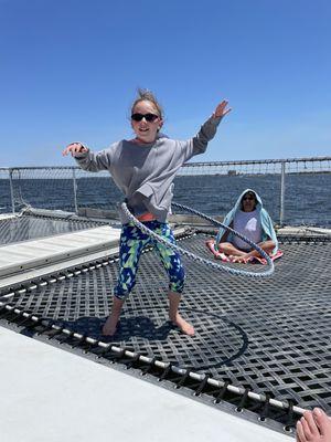 Hula hooping over the ocean