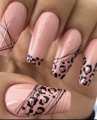 Long coffin nails with leopard nail art