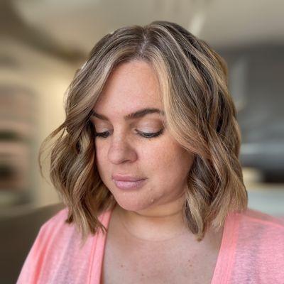 A beach wave lob with a bold money piece