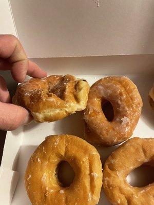 Stale donuts with a smashed one to boot!