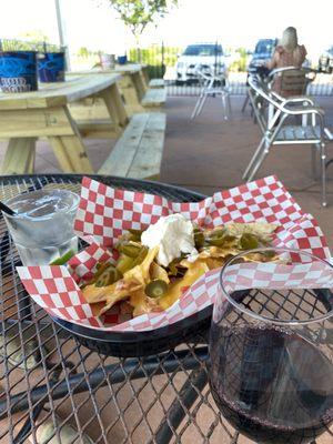 Gin & seltzer and wine with nachos. Perfect combo.