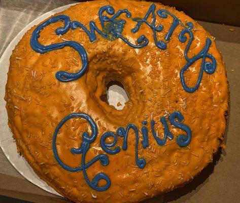 Donut cake to celebrate a colleagues amazing commitment to his work.  The sweaty genius loved this decadent treat and looks sweet.