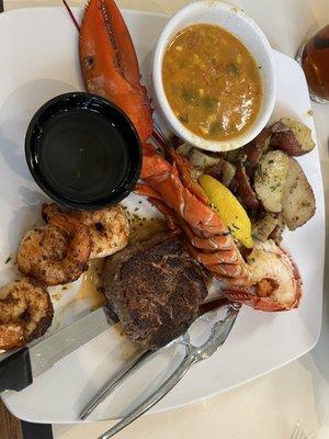 Surf & Turf...lobster, steak & shrimp with corn bisque and potatoes & herbs... always an excellent choice!