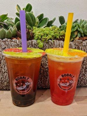 Passion fruit black tea with boba + strawberry green tea with strawberry jelly