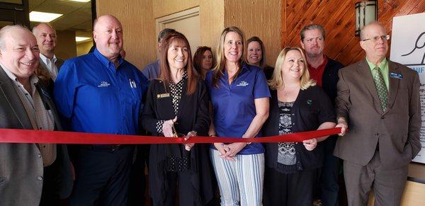 Our ribbon cutting with the Chamber