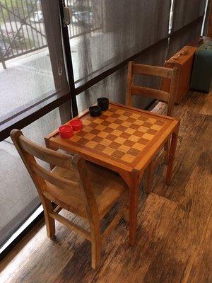 A friendly game of checkers while you wait for your train.