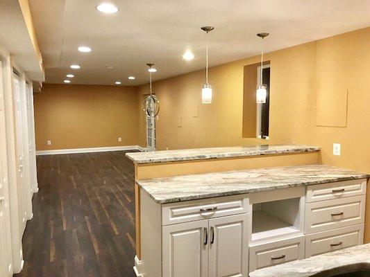 Custom Basement Finish in Fairfax, VA w/ Wet Bar, Full Bathroom, & Egress Window.