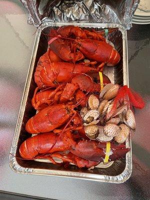 Lobsters and steamers prepared by Sea Well