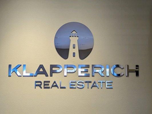 Klapperich Real Estate Sign in Lobby in Fond du Lac, Wisconsin.