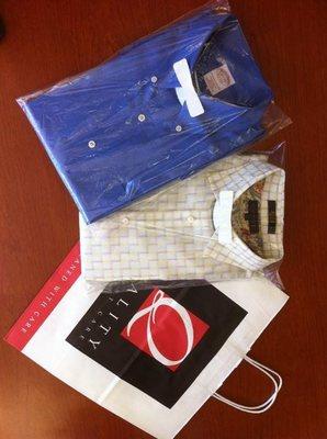 Men's business shirts folded and ready to wear or pack for your trip!