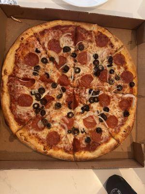 Pepperoni, black olives and onion pizza