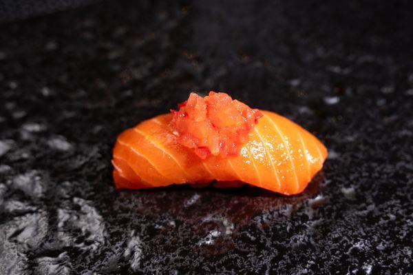 King salmon topped with chopped tomato