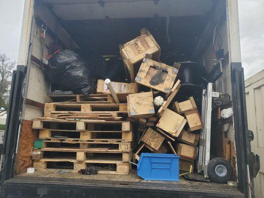 Wood pallets and wood boxes hauling away