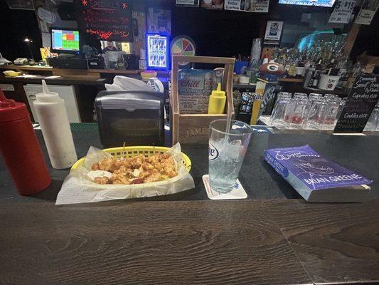 Cheese Curds (deep-fried) - $7 Double UV Blue & Seltzer - $6 Book & Atmosphere