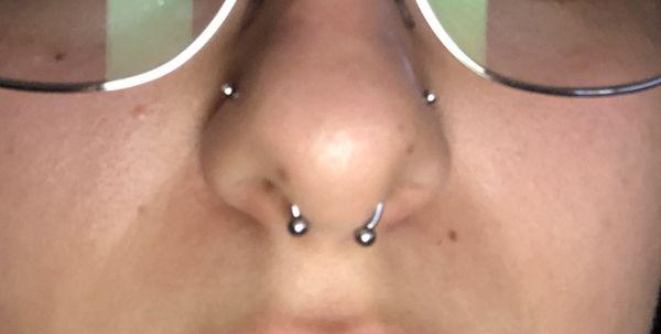 2 nose piercings/ septum