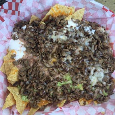 Carne asada nachos good but service needs improvement