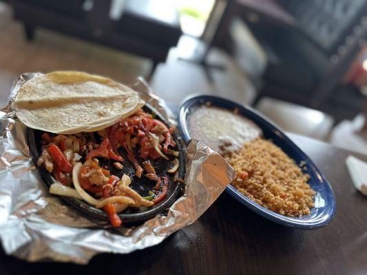 Chicken fajitas on day one - ordered without revisions. Lots of onions and peppers.