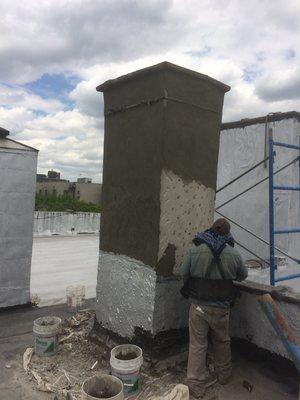 Repairing stucco on chimney cracking in Queens !