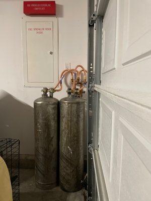 Our water softener tanks will be replaced every 2 weeks (large family!) and meet our HOA rules by being stored in the garage.