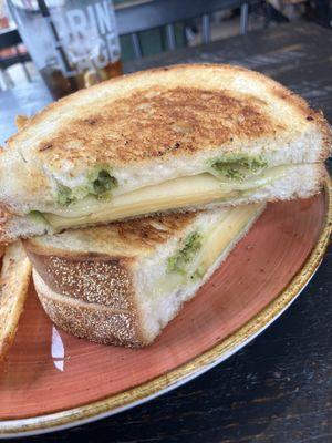 The So-Cal grilled cheese. It's smoked Gouda cheese with avocado spread, and pesto on sourdough bread.