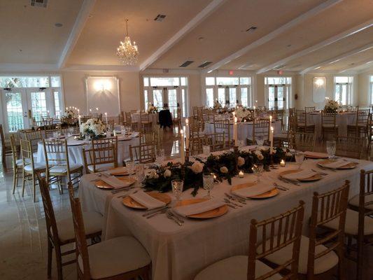 Large chandeliers with tables perfectly setup!