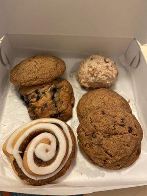 Chocolate chip cookies, cinnamon roll, blueberry scone, coconut macaroon