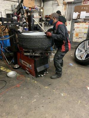 Installing tires to 26 inch rims and balancing.