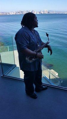 Playing sax on the SanDiego Harbor