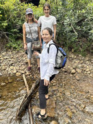 Crossing over the creek to get to waterfalls